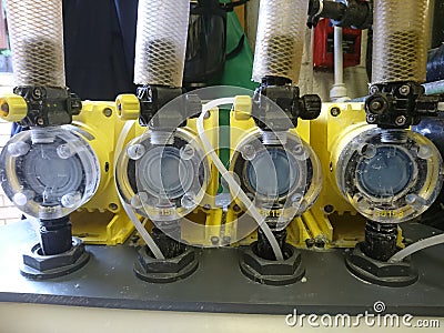 Pool Plant Chemical Dosing Pumps Stock Photo