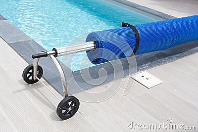 Pool protection tide blanket blue bubble cover heat temperature Stock Photo