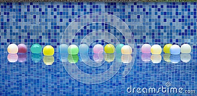 Outdoor blue swimming pool filled with colorful balls Stock Photo