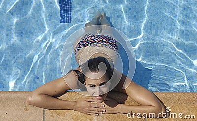 A Pool woman enjoying a summer day Stock Photo