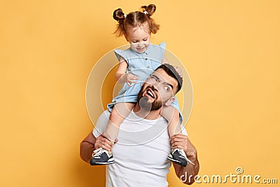 Poor frustrated daddy doesn`t know how to make kid to obey him Stock Photo