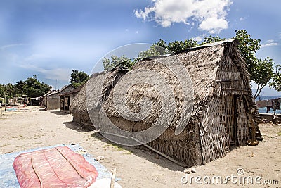 Poor hut seaweed growers, Nusa Penida, Indonesia Stock Photo