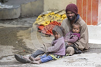 Poor Indian beggar family on street in Leh, Ladakh, India Editorial Stock Photo