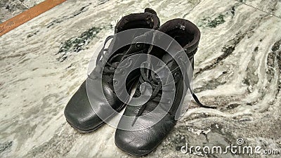 Poor man shoes Stock Photo