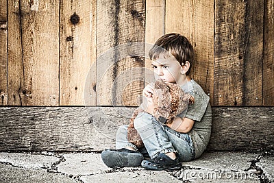 Sad Homeless Boy Stock Photo