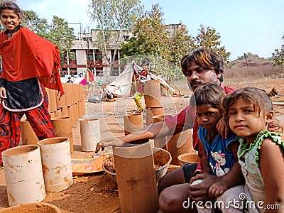 poor village kids looking at camera in natural environment in India 2019 Editorial Stock Photo