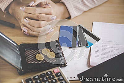 Poor woman having problem with due date calendar for credit card payment Stock Photo