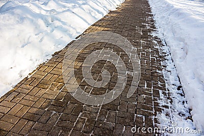 Poorly laid paving slabs after winter Stock Photo