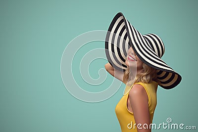 Pop art portrait of beautiful woman in hat. Stock Photo