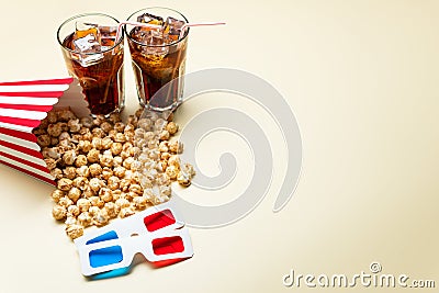Popcorn and cold drink near 3D glasses Stock Photo