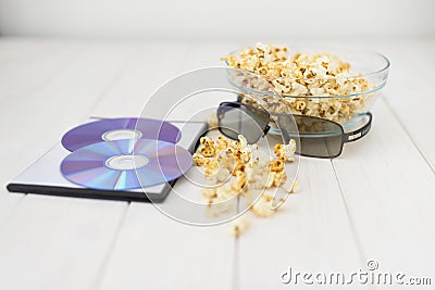 Popcorn and disks and 3D glasses Stock Photo
