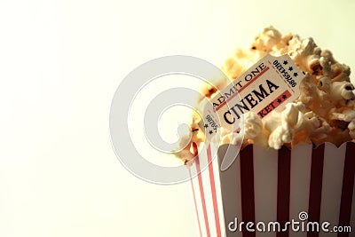 Popcorn and movie tickets on white background vintage Stock Photo