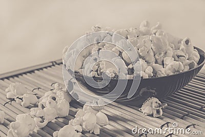 Popcorn over filled in bowl, vintage edited Stock Photo