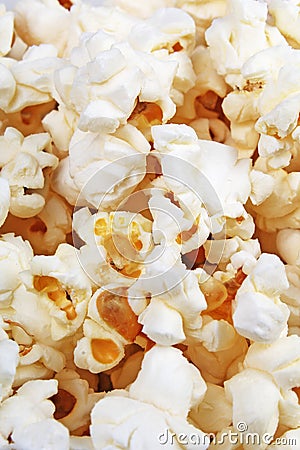 Popcorn texture. Popcorn snacks as background. Stack pile popcorn pattern. Stock Photo