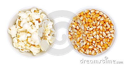 Popped and unpopped popcorn, a popular snack in white bowls Stock Photo