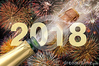 Popping champagne and fireworks at new years eve 2018 Stock Photo