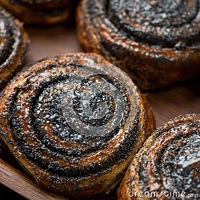 Poppy buns. Sweet buns with poppy seeds fresh from the oven. Pastries, dessert Food. Close up shot. Square format for Stock Photo