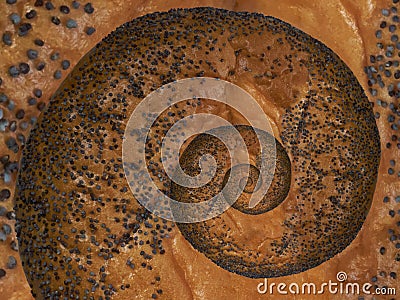Poppy seed baked cracknel bublik spiral abstract fractal effect pattern background. Crispy crust cracknel bublik baranka abstract Stock Photo