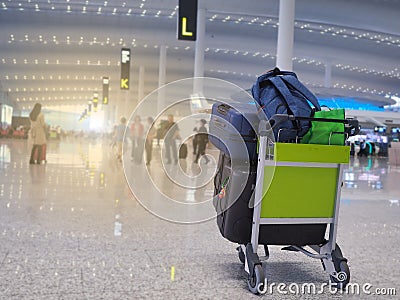 Popular airport flights are popular. And there are many people to use the service. This image is blurry. Stock Photo