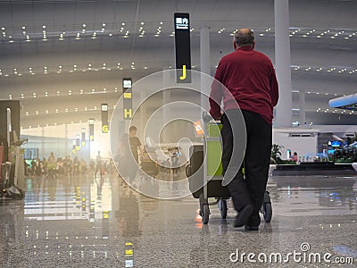 Popular airport flights are popular. And there are many people to use the service. This image is blurry. Editorial Stock Photo