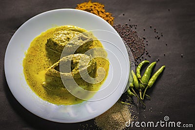 Popular Bengali Illish/Hilsa fish curry with grinned mustard seed. Stock Photo