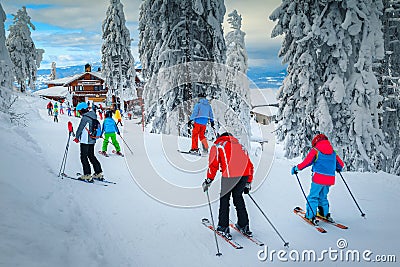 Popular ski resort with skiers on the slope, Poiana Brasov Editorial Stock Photo