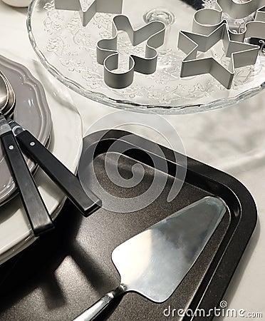 Porcelain Dishes, Plates, Cake Spatula and Silverware Stock Photo