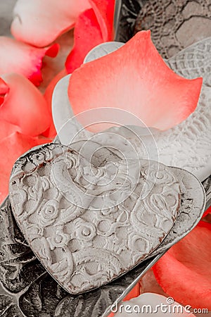 Porcelain Hearts and Rose Peddles Stock Photo