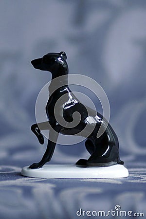 Porcelain italian greyhound statue Stock Photo