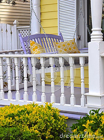 Porch Decor Features Yellow Pillows Stock Photo