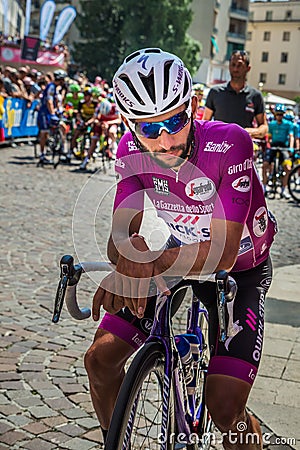 Pordenone, Italy May 27, 2017: Professional cyclist Fernando Gaviria Quick Step Team, in purple jersey, in first line. Editorial Stock Photo