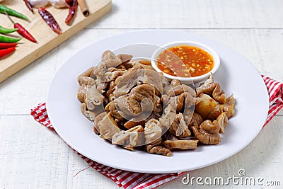 Pork intestine stewed in the gravy with chilli sauce Stock Photo