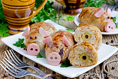Pork meatballs stuffed with minced meat and rice in crispy chicken skin shaped funny pigs Stock Photo