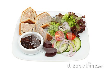 Pork pie pickle and salad on a plate Stock Photo