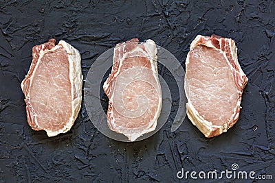 Pork, raw, steak, meat, fillet, food, board, fresh, red, chop, Selective focus, top view, copy space Stock Photo