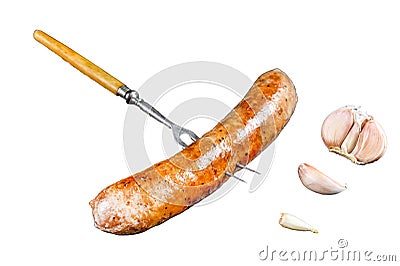 Pork Sausage bbg grilled with spices and herbs on a meat fork. Isolated on white background, Top view. Stock Photo