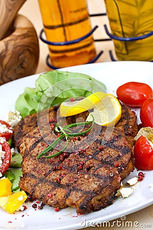 Pork steak,grilled with salad Stock Photo