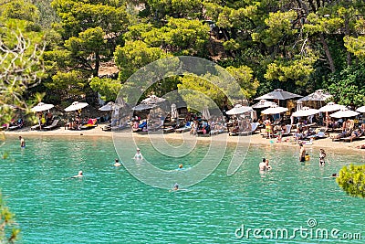 Poros, Greece 28 June 2023. Love bay beach with local people and tourists enjoying summer vacations. Editorial Stock Photo