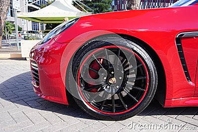 Porsche car front wheel in the 'Automotive Fair Albania'. Editorial Stock Photo