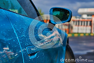Porsche 911 Carrera 4S & x28;Miami Blue& x29; 992 Sports front door and side mirror close-up. Place for your text. Editorial Stock Photo