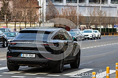 Porsche luxury car in traffic in Bucharest, Romania, 2022 Editorial Stock Photo