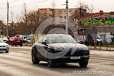 Porsche luxury car in traffic in Bucharest, Romania, 2022 Editorial Stock Photo