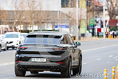 Porsche luxury car in traffic in Bucharest, Romania, 2022 Editorial Stock Photo