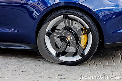 Porsche Taycan front wheel Editorial Stock Photo