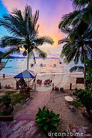 Port Barton Beach at sunset on paradise island, tropical travel destination - Port Barton, San Vicente, Palawan, Philippines Editorial Stock Photo