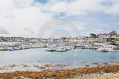Port of Camaret-sur-mer with its boats, its lighthouse, in FinistÃ¨re in Brittany Stock Photo