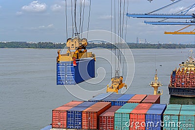 Port cargo crane and containers Stock Photo