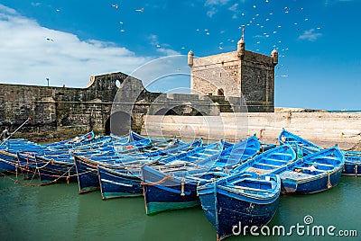 Blue boats in the port of Essaouira Stock Photo