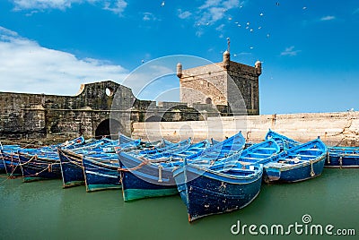 Blue boats in the port of Essaouira Stock Photo