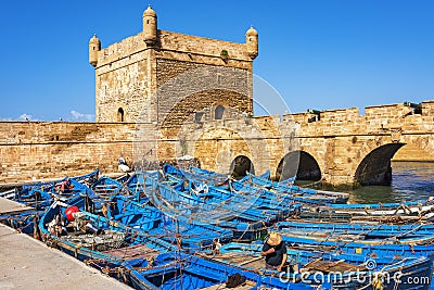 Port of Essaouira in Morocco with fleet of blue fishing boats Editorial Stock Photo